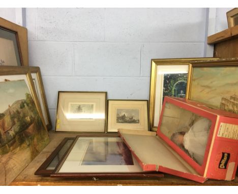 A shelf of assorted pictures and prints, and a Chiltern doll