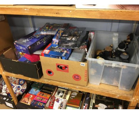 A shelf of assorted toys and games