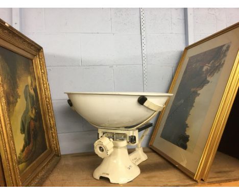 A shelf of assorted, to include pictures, prints and baby scales