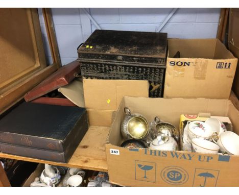 Silver plate, brass, cameras, a deed box etc., on one shelf