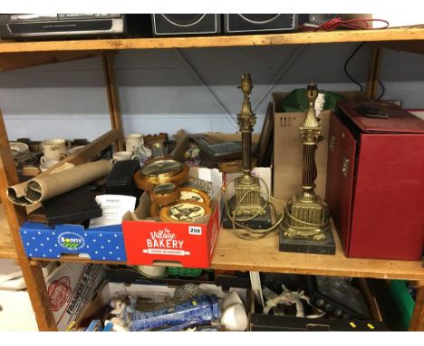 A shelf of assorted, to include barometers and standard lamps etc.