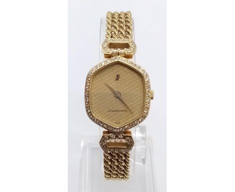 Vintage 18ct gold Audemars Piguet ladies watch with diamond encrusted bezel and shoulders, twisted rope bracelet in solid 18c