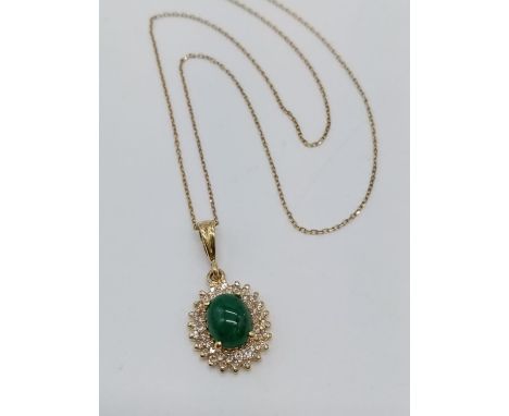 14CT CABOCHON EMERALD AND DIAMOND PENDANT ON A 40CM LONG 18CT GOLD CHAIN, WEIGHT 3.9G 
