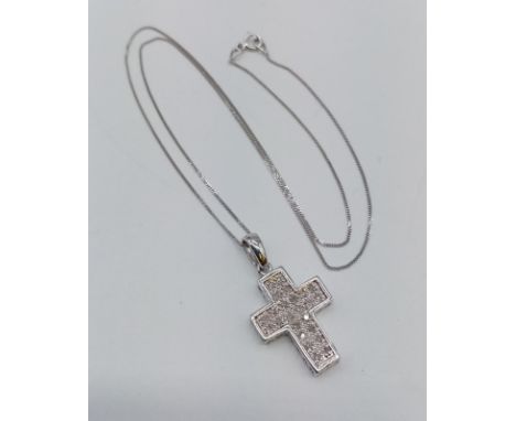 9ct white gold diamond cross pendant on 38cm chain, weight 2.6g 