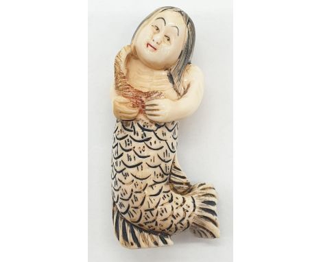 JAPANESE VERY COLLECTABLE&nbsp; IVORY NETSUKE MERMAID CARRYING SEAWEED 1890- 5cm long.