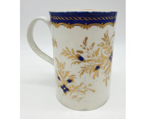 Early English - circa 1800 Caughley Porcelain Tankard, decorated with blue and gilded flowers, 13cm tall 