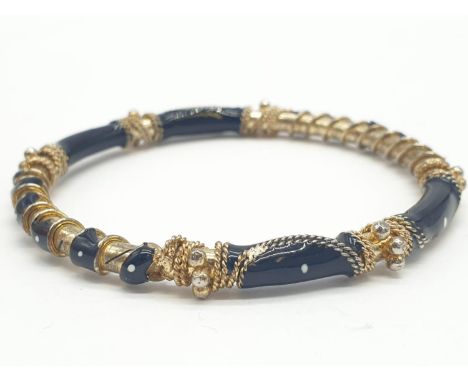 Ornate enamel dress bangle. 24.8g in weight. 6cm in diameter. 