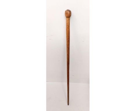 Gentleman's antique walking stick, with brass studs on the holder and a brass tip-end, 88cm long 