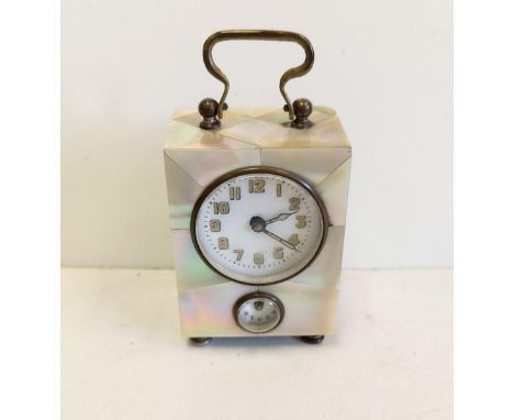 German mother of pearl cased alarm clock, with twin face. 5x6cm. 