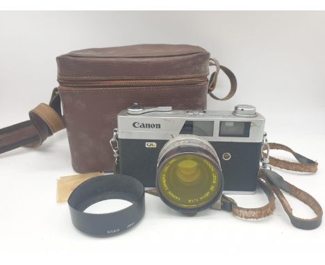 A Canon Canonet - QL19 camera-canon lens SE 45mm. As found, with case. 