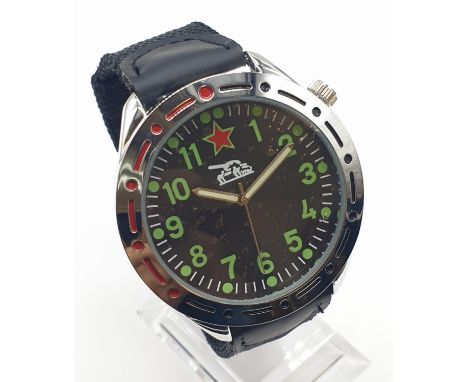 A new and unused 1980's Russian tank watch with original instructions and box. 