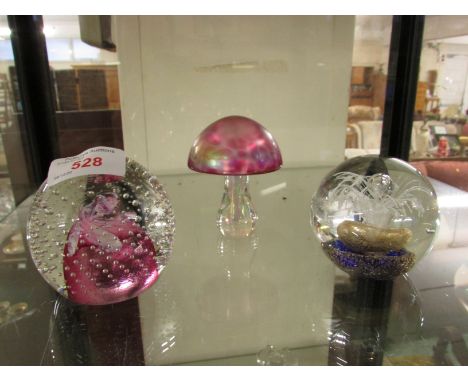 CAITHNESS 'CAULDRON RUBY' PAPERWEIGHT, IRIDESCENT GLASS MUSHROOM PAPERWEIGHT AND ONE OTHER GLASS PAPERWEIGHT