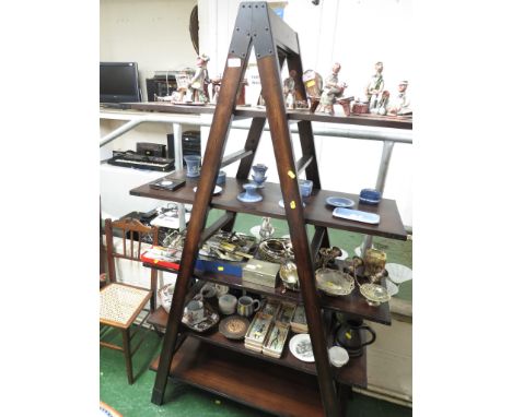 DARK WOOD VENEERED FIVE-TIER OPEN SHELF UNIT ON A TRAPEZOID FRAME