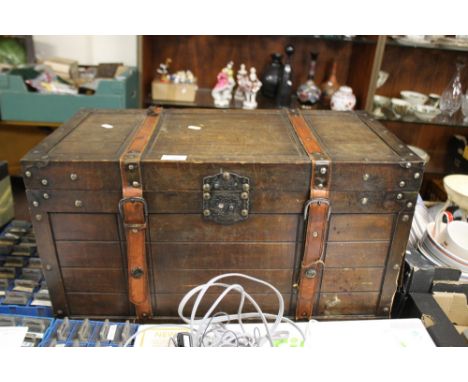 A REPRODUCTION WOODEN TRUNK