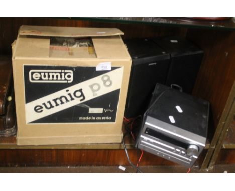 A EUMIG P8 FILM PROJECTOR IN BOX TOGETHER WITH A PANASONIC CD PLAYER, WITH SPEAKERS