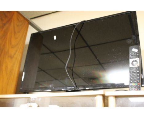 AN HITACHI 33" FLATSCREEN TV AND REMOTE CONTROL