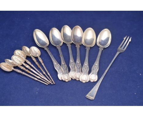 A set of six Victorian silver teaspoons, by Josiah Williams & Co., London 1893, with cream pattern finials; together with a s