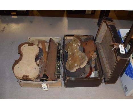 Parts of instruments, to include: clarinet and violin, in two boxes.