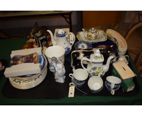 Ceramics, to include: a Lladro figurine of bride and groom; Melba ware figurines of cows; tea cups; plates; coffee pots; and 