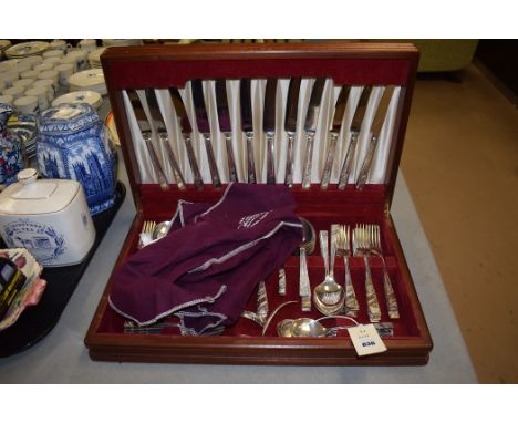 A canteen of silver-plated cutlery and flatware, in wooden fitted case.