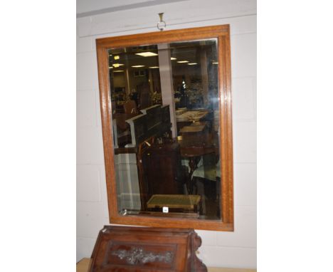Light oak framed rectangular wall mirror, 71cms wide.