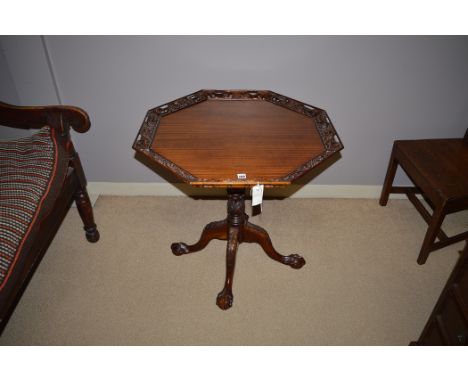 Mahogany Georgian style tripod table with carved octagonal drop, 77cms.