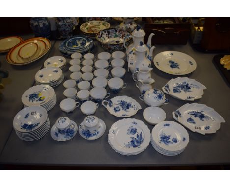 A Royal Copenhagen blue flowers pattern tea and dinner service, with hand-painted decoration, to include: tea cups and saucer