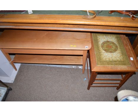 An Ash two-tier coffee table, 100cms wide; together with a tile top nest of three teak tables.