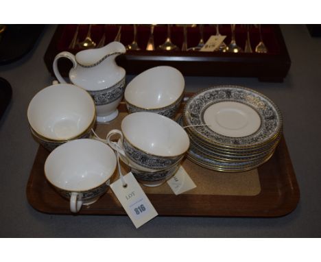 A Royal Doulton 'Baronet' pattern part tea service, to include: tea cups and saucers, cream and sugar bowl.