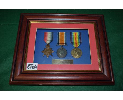 A trio of First World War medals awarded to Private John Simm, Durham Light Infantry, No. 4-8350, to include: 1914-15 Star Wa