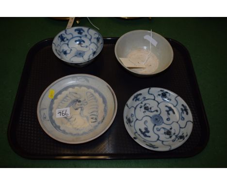 Tek Sing Chinese blue and white ceramic bowls and dishes, with Nagel Auction labels. (4)
