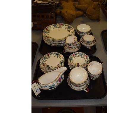 A Royal Cauldon 'Victoria' pattern part tea and dinner service, to include: dinner plates, tea cups and saucers, gravy boat, 