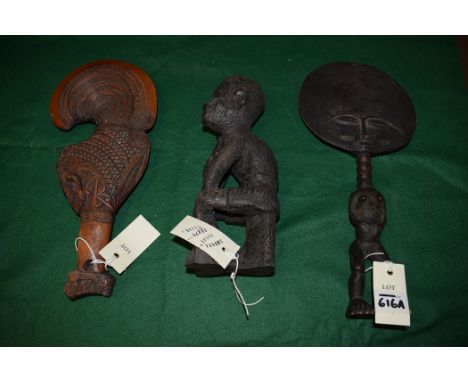 Tribal artifacts, comprising: two African carved modern figures, one Ashanti fertility figure, and the other depicting a seat