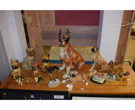 Ceramic and composition dog figurines by Border Fine Arts; Woodlander; Tudor Stoneware; and others.  (qty)