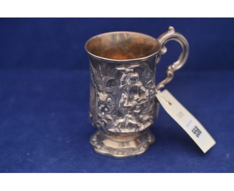 A Victorian silver tankard, by James Charles Edington, London 1851, with gilt interior and relief decoration depicting figure