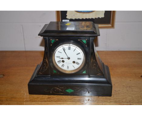 A French black plate and green malachite inlaid mantel clock by M Johnson Paris, two train spring driven movement, 30cms wide