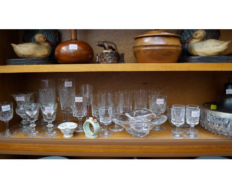 A Daum clear glass bowl, 17cm wide; together with another smaller Daum example; and a quantity of glass; together with a pear