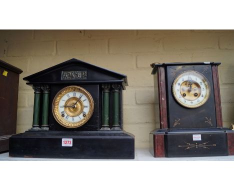 An Ansonia black painted mantel clock, of architectural form, 38cm wide; together with another slate mantel clock.