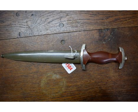 A German World War II NPEA dagger and scabbard, the blade inscribed 'Karl Burgsmuller, Berlin - Charlottenburg', (handle poss