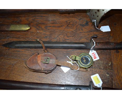 A World War I period bayonet; together with similar brass compass and leather case, the case inscribed 'L French & Son Ltd'.