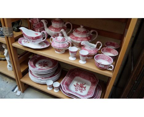 A Spode 'Pink Camilla' pattern part tea and dinner service. 