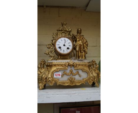 A late 19th century gilt metal and white onyx mantel clock, 36cm high. 