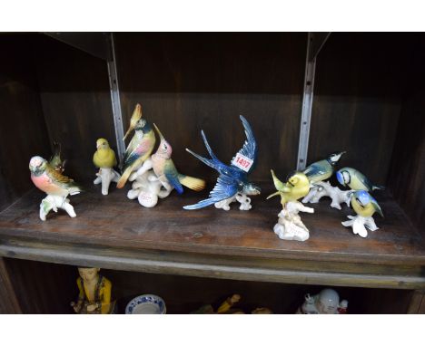Six various Karl Ens bird figures, (repair to one); together with a similar Goebel example; and a Hutschenreuter example, (ti