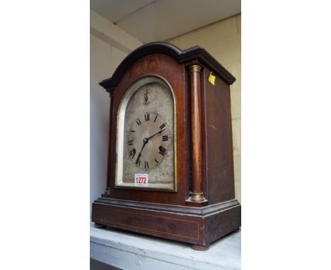 An early 20th century mahogany and inlaid mantel clock, 35.5cm high.
