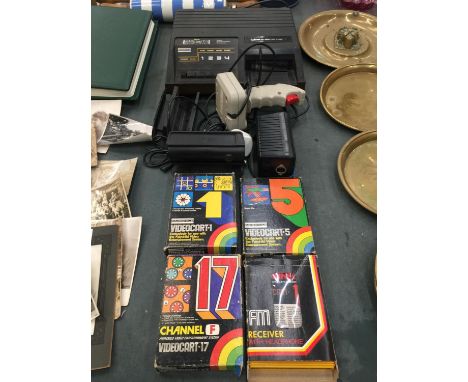 AN ADMAN FAIRCHILD GRANDSTAND CONSOLE TO INCLUDE A JOYSTICK, POWERMPACK AND FOUR GAMES 