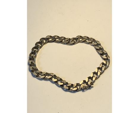A HEAVY SILVER FLAT LINK BRACELET 