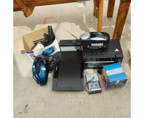 AN ASSORTMENT OF ITEMS TO INCLUDE A ROBERTS RADIO, A SAMSUNG TELEVISION AND A VACUUM CLEANER ETC 