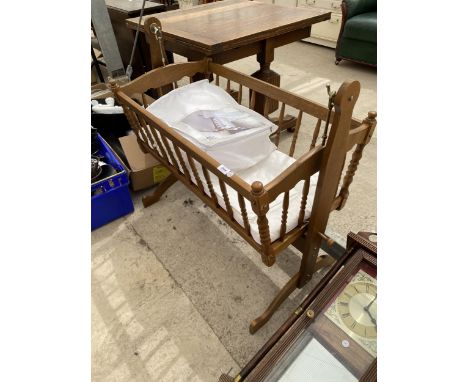 A VINTAGE STYLE WOODEN CHILD'S COT 