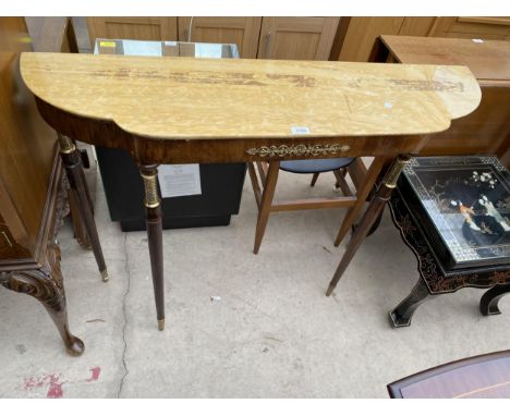 AN EMPIRE STYLE CONSOLE TABLE ON TURNED LEGS WITH BRASS DECORATION, 45" WIDE 