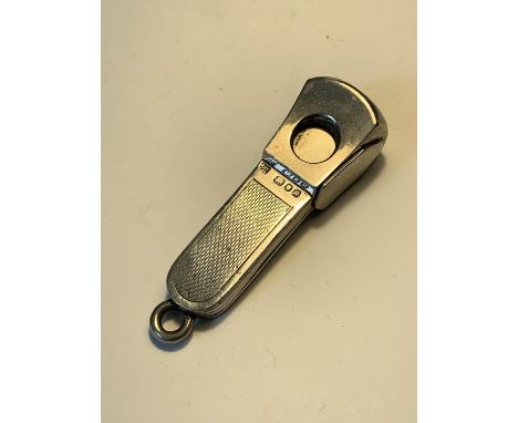 A HALLMARKED LONDON SILVER CIGAR CUTTER GROSS WEIGHT 30.88 GRAMS 